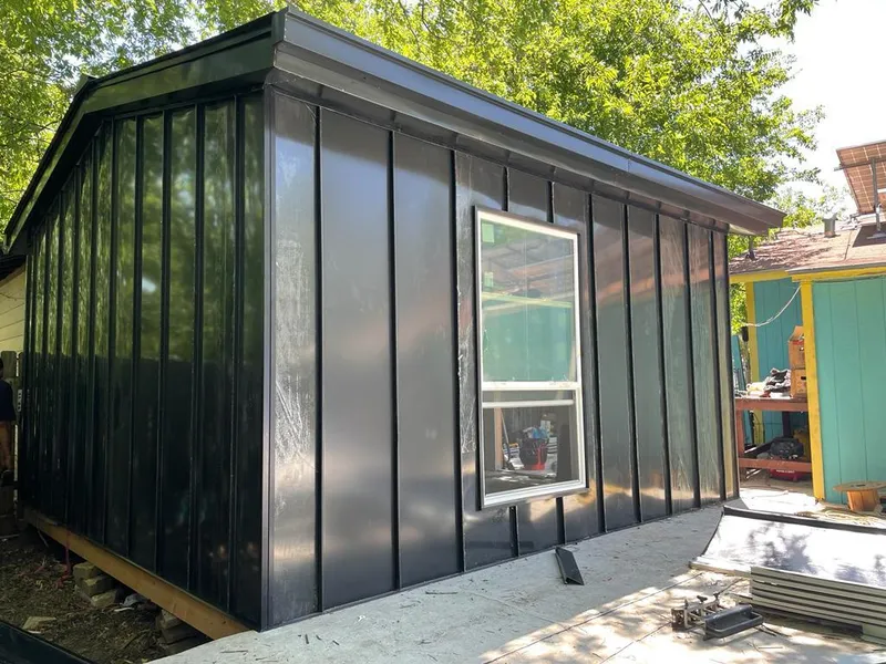 Black standing seam metal wall panels for Metal Roof Installation in New Hartford