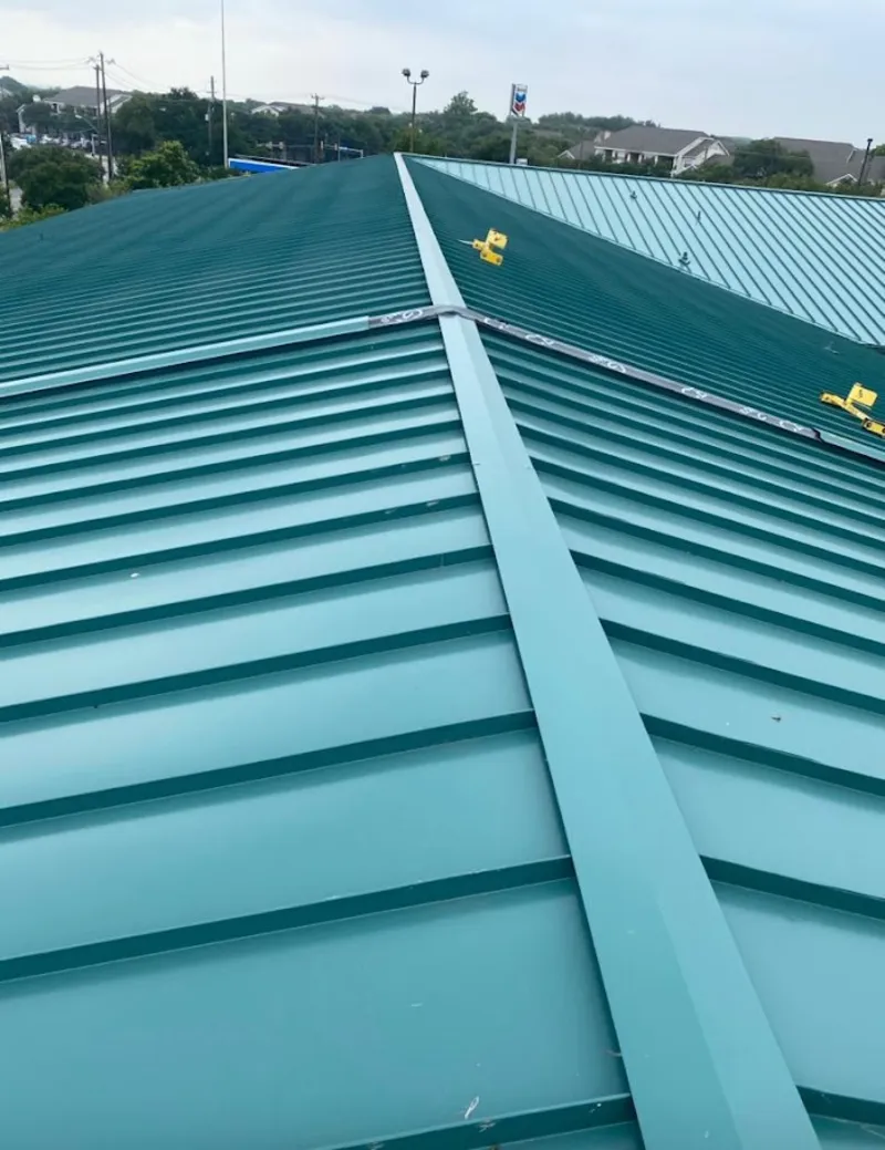 Green commercial metal roof ridge and valley for Metal Roof Repair in New Hartford